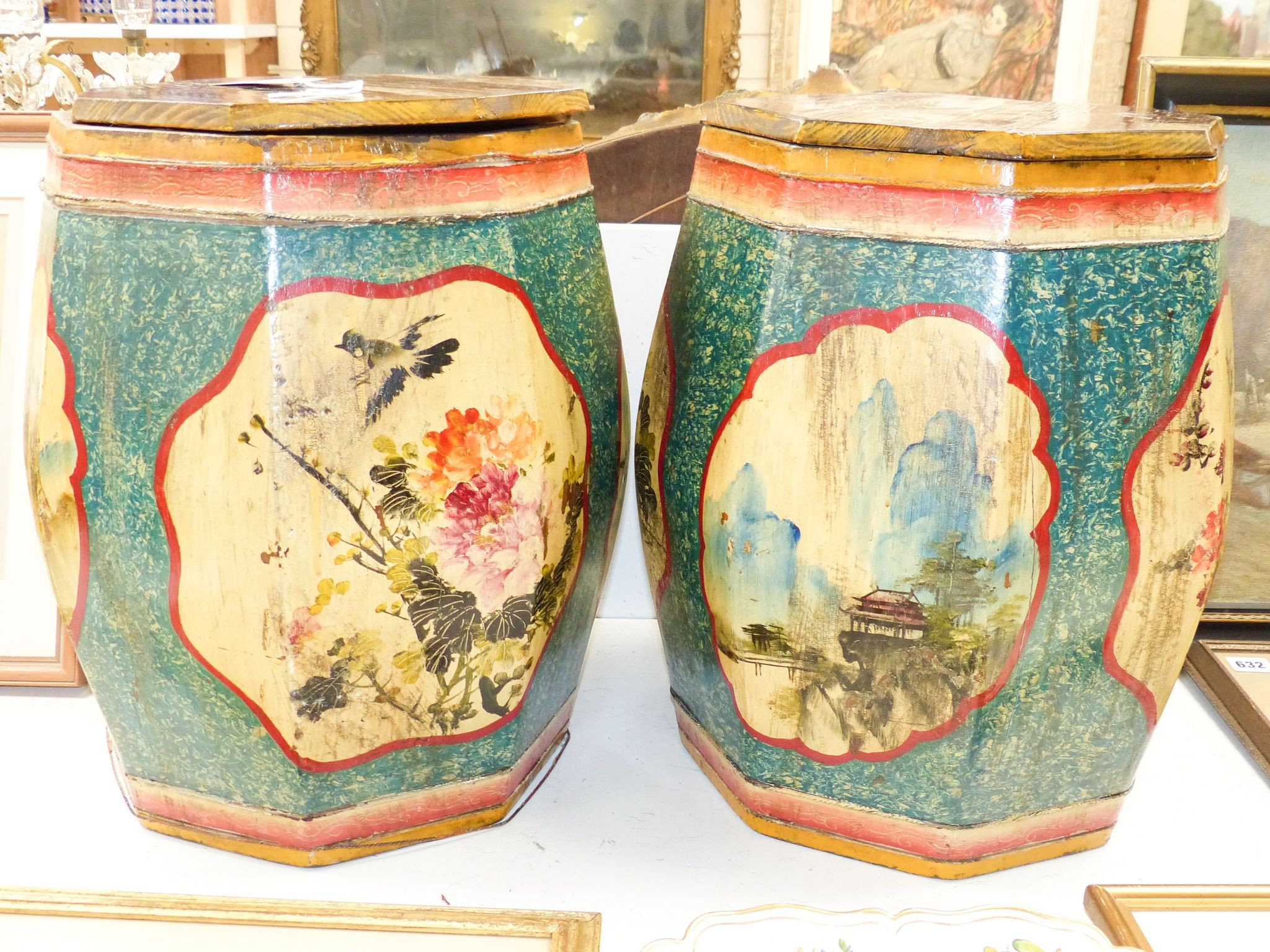 A pair of Chinese painted wood octagonal rice bins 45cm